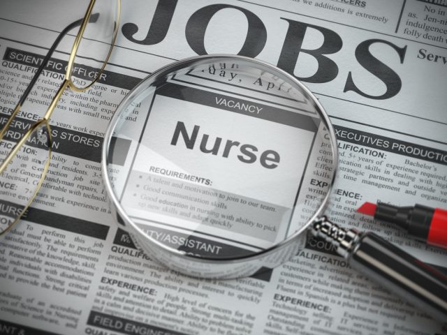 Nurse vacancy in the ad of job search newspaper with loupe. 3d illustration